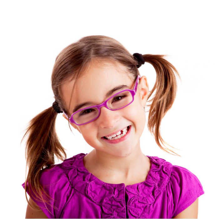 Girl in a purple shirt wearing cute purple glasses.