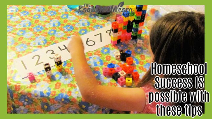Homeschool Success IS possible with these tips. Photo of girl using linking cubes with a number line to do her math by Bonnie Way.