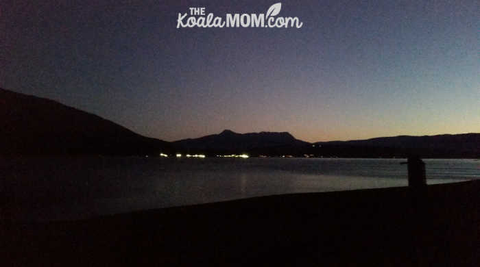 Lights of Salmon Arm on Shuswap Lake after dark.