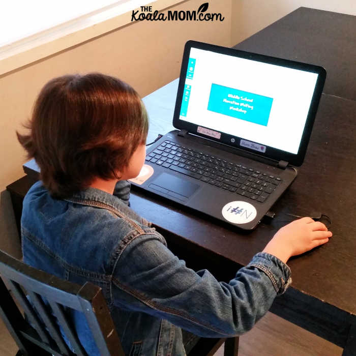 10-year-old looks at her Middle School Narrative Writing Workshop from WriteAtHome.