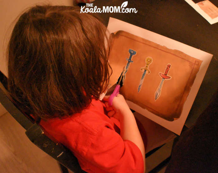 5-year-old Pearl helps cut out the pieces for Houdini's Secret Room.