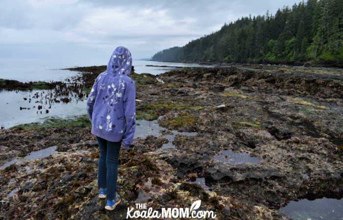 Junior high student exploring rocky coasts.