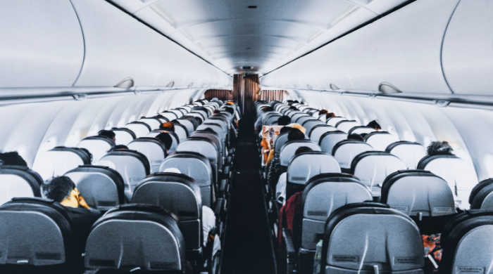 Book seats at the back of the plane when flying with a baby or toddler.