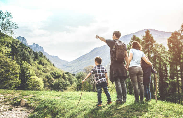 Family hiking together on a weekend getaway.