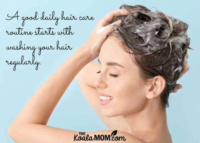 A good daily hair care routine starts with washing your hair regularly (like this woman shampooing her brown hair).