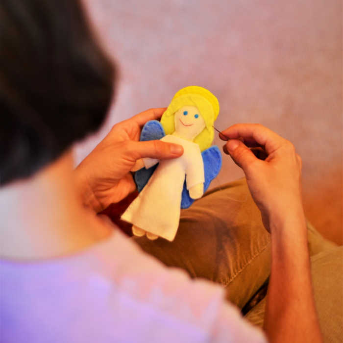 Madeleine Karako sews a saint doll for her Etsy site, Zelie Crafts.