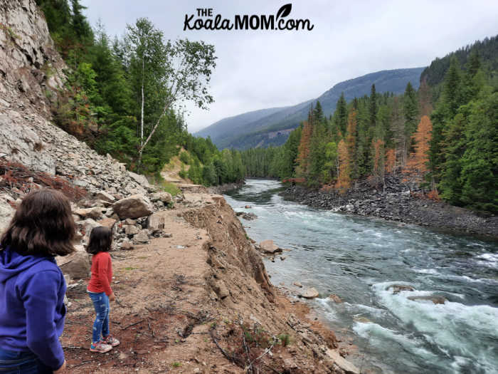 Two kids look at the Clearwater River.