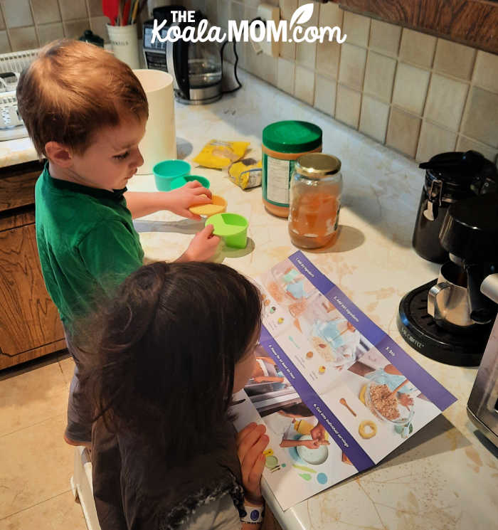 4yo and 6yo get ready to make granola bars together.