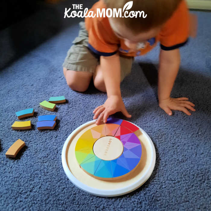 The Lovevery wooden colour puzzle in the Analyst play kit.