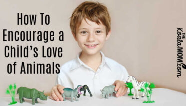 How To Encourage a Child’s Love of Animals (choose animal toys for them to play with, like this boy).