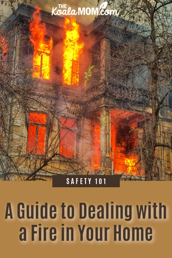 A Guide to Dealing with a Fire in Your Home. Photo of burning house surrounded by trees by Chris Karidis on Unsplash.