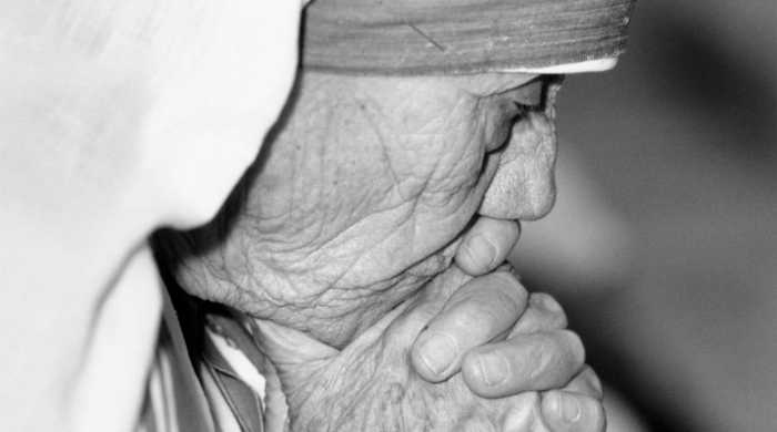 Mother Teresa praying.