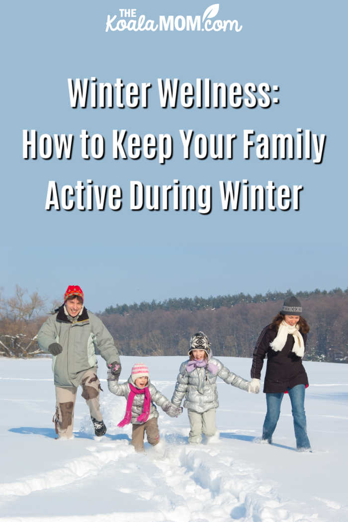 Winter Wellness: How to Keep Your Family Active During Winter. Photo of family having fun in the snow via Depositphotos.