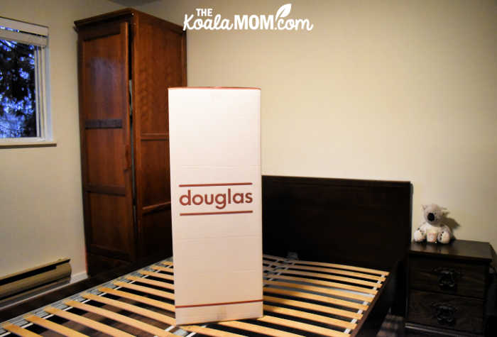 Douglas mattress-in-a-box sits on a queen-size bed frame.