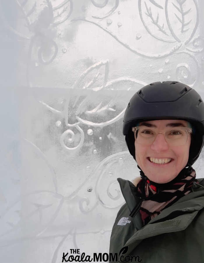 Bonnie Way takes a selfie with the ice castle at Lake Louise.