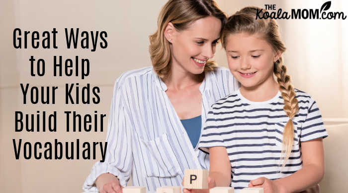 Great Ways to Help Your Kids Build Their Vocabulary. Photo of mom and child playing with letter blocks via Depositphotos.