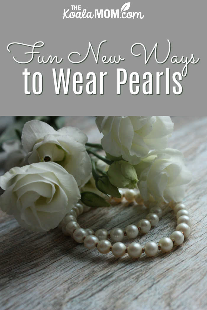 Fun New Ways to Wear Pearls Now. Photo of white roses and pearl necklace on white table by Eugenia Romanova on Unsplash