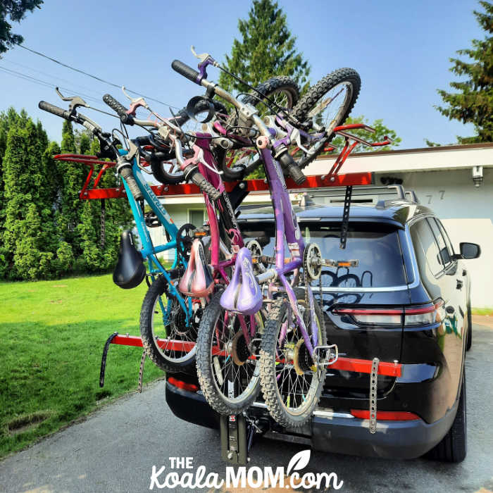 Three kids bikes loaded onto a VelociRAX 6.