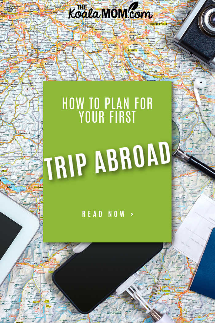 How to Plan for Your First Trip Abroad. Photo of map, phone, and notebooks via Depositphotos.