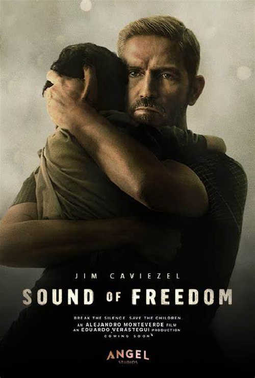 Sound of Freedom movie poster shows Jim Caviezel as Tim Ballard, holding a child rescued from sex trafficking.