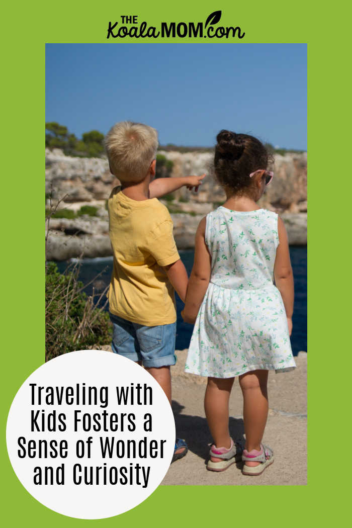 How Traveling with Kids Fosters a Sense of Wonder and Curiosity. Photo of two children looking out over ocean by Torsten Dederichs on Unsplash.