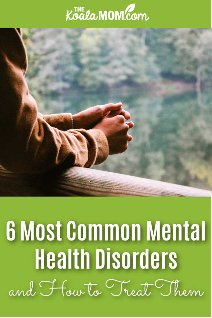 6 Most Common Mental Health Disorders and How to Treat Them. Photo of person leaning their elbows on a bridge over a lake by Ümit Bulut on Unsplash