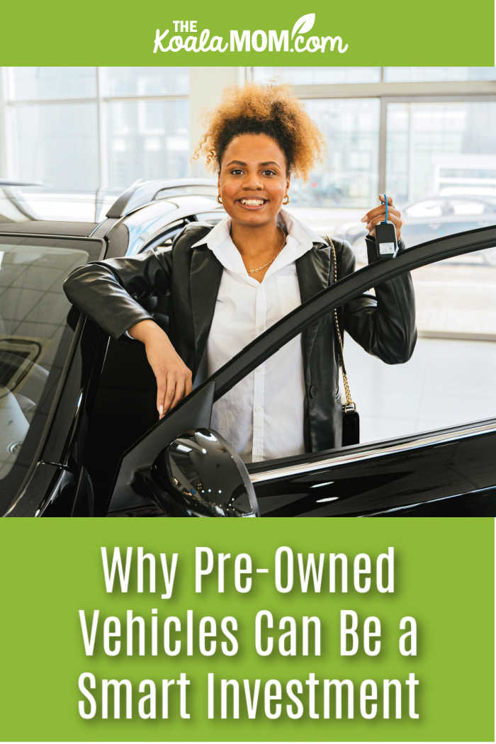 Why Pre-Owned Vehicles Can Be a Smart Investment. Photo of happy woman holding keys to her used car by Antoni Shkraba via Pexels.