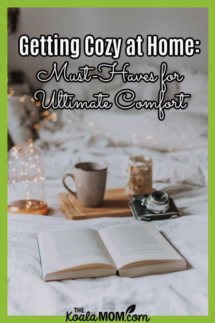 Getting Cozy at Home: Must-Haves for Ultimate Comfort. Image of tea, book and fairy lights on bed by fotografierende from Pixabay