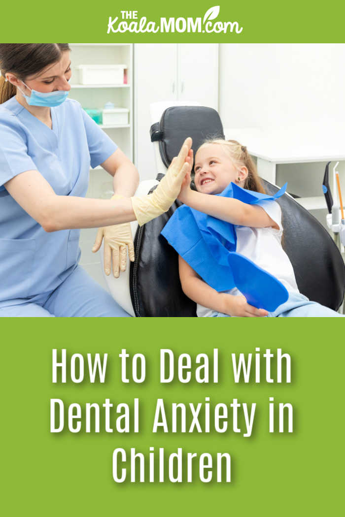 How to Deal with Dental Anxiety in Children. Photo of dentist high-fiving a smiling girl via AdobeStock.