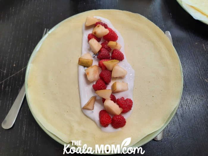 Strawberry, banana and yogurt on a crepe.