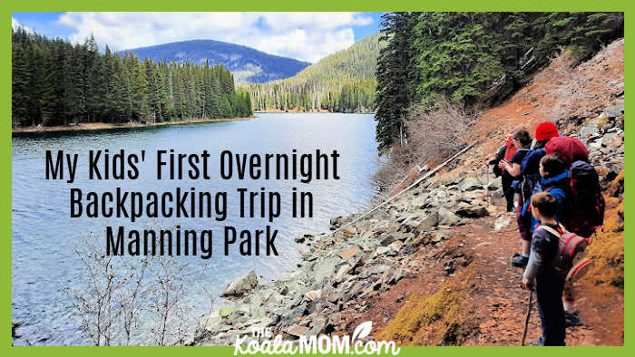 My Kids' First Overnight Backpacking Trip in Manning Park. Photo of kids wearing packs looking at Lightning Lake by Bonnie Way.