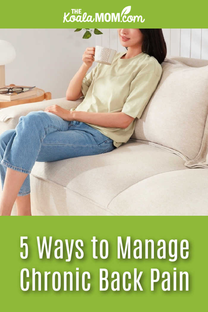 5 Ways to Manage Chronic Back Pain. Stock photo of woman sitting on a white couch sipping a cup of tea.