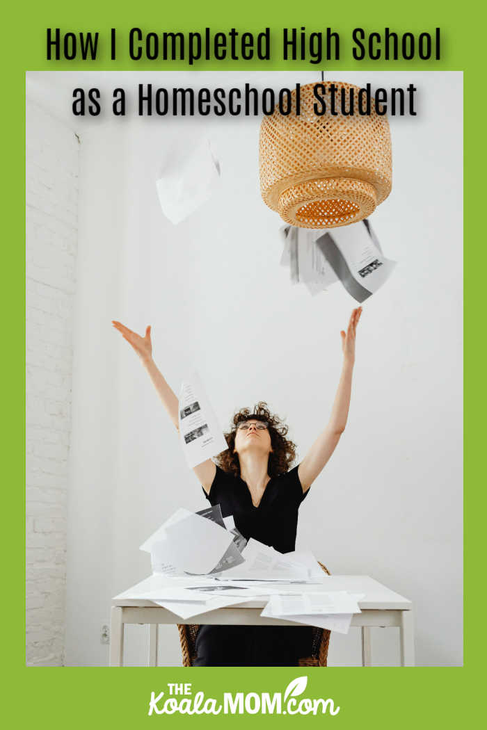 How I Complete High School as a Homeschool Student. Photo of a female student sitting at a desk throwing her papers in the air by Kaboompics.com via Pexels.