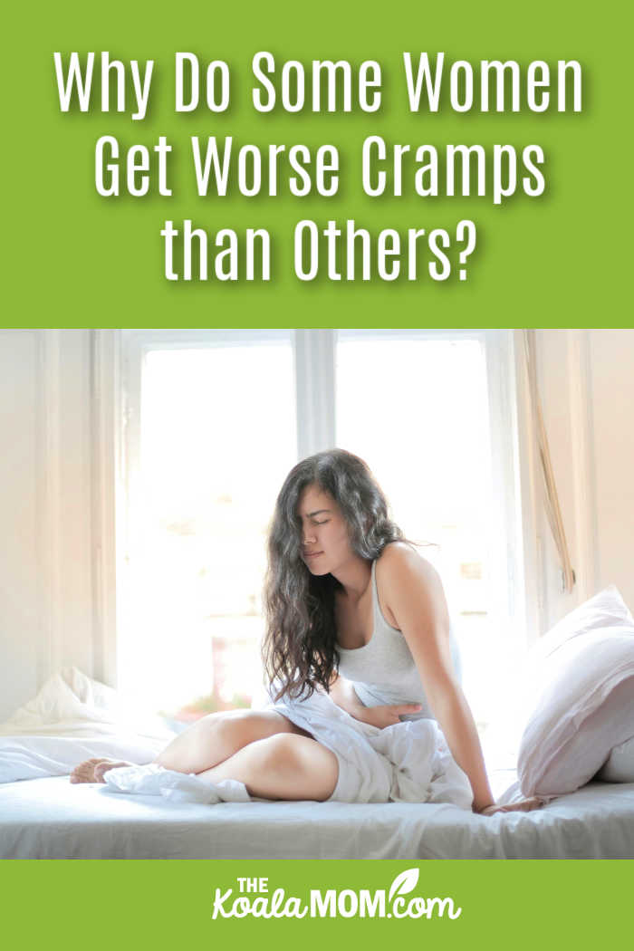 Why Do Some Women Get Worse Cramps than Others? Photo of woman sitting on bed holding her stomach in pain by Andrea Piacquadio via Pexels.