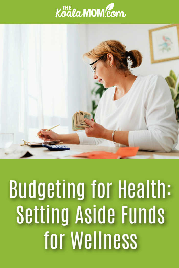 Budgeting for Health: Setting Aside Funds for Wellness. Photo of woman holding cash and looking at her budget by Kaboompics.com via Pexels.