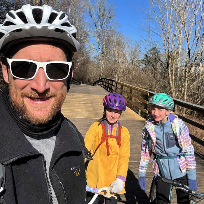 MyChoreBoard app creator Jacob Volk biking with his daughters. Photo by Jacob.