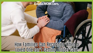 How Families Can Recognize When a Loved One Isn’t Getting Proper Care. Photo of person holding hands with person in a wheelchair by Ivan S via pexels.