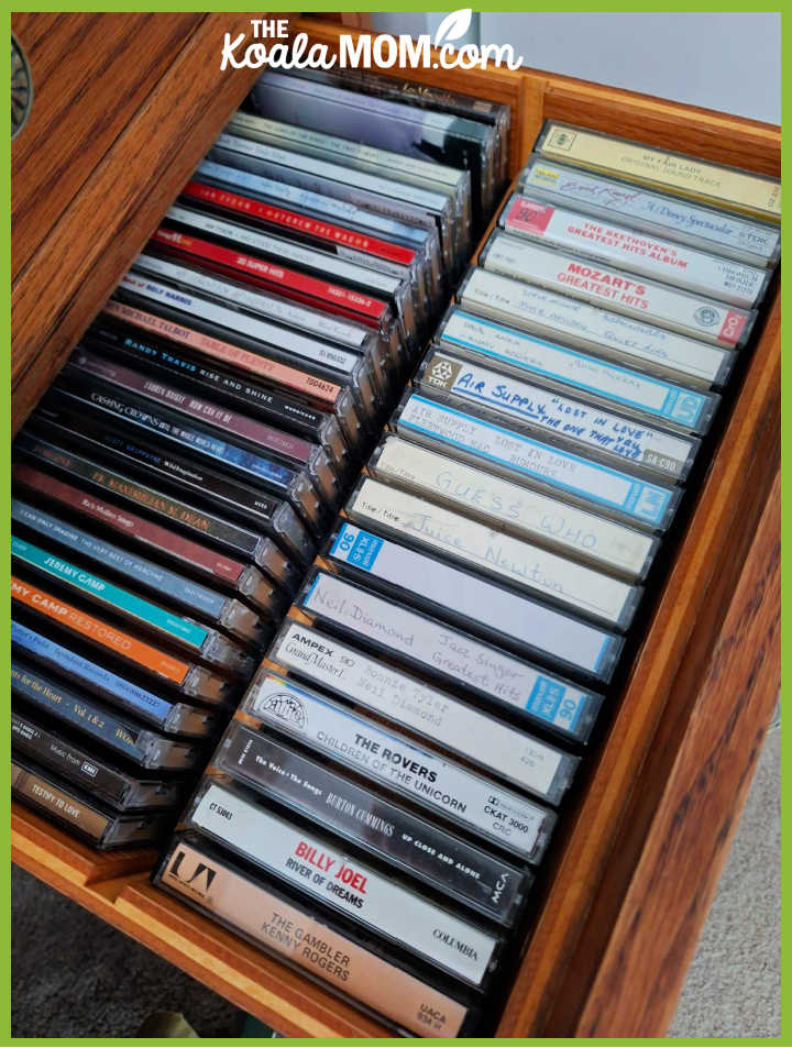 Photo of CDs and tapes lined up in a drawer by Bonnie Way.