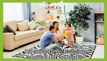 Tips and Hacks to Make a Busy Household Look Put Together. Photo of mom and dad sitting on a rug in their living room, playing with toddler, by ShotPot via Pexels.