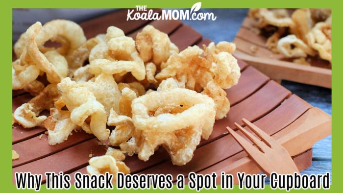 Why This Snack Deserves a Spot in Your Cupboard. Photo of pork rinds on a wood place, with wooden fork resting nearby, by The Findin Pixels via Pexels.