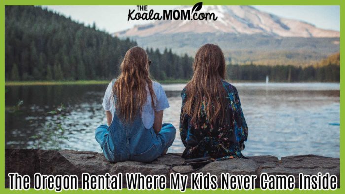 The Oregon Rental Where My Kids Never Came Inside. Photo of two teens sitting on some rocks, looking at a lake with Mt. Hood in the background, by Roberto Nickson via Pexels.