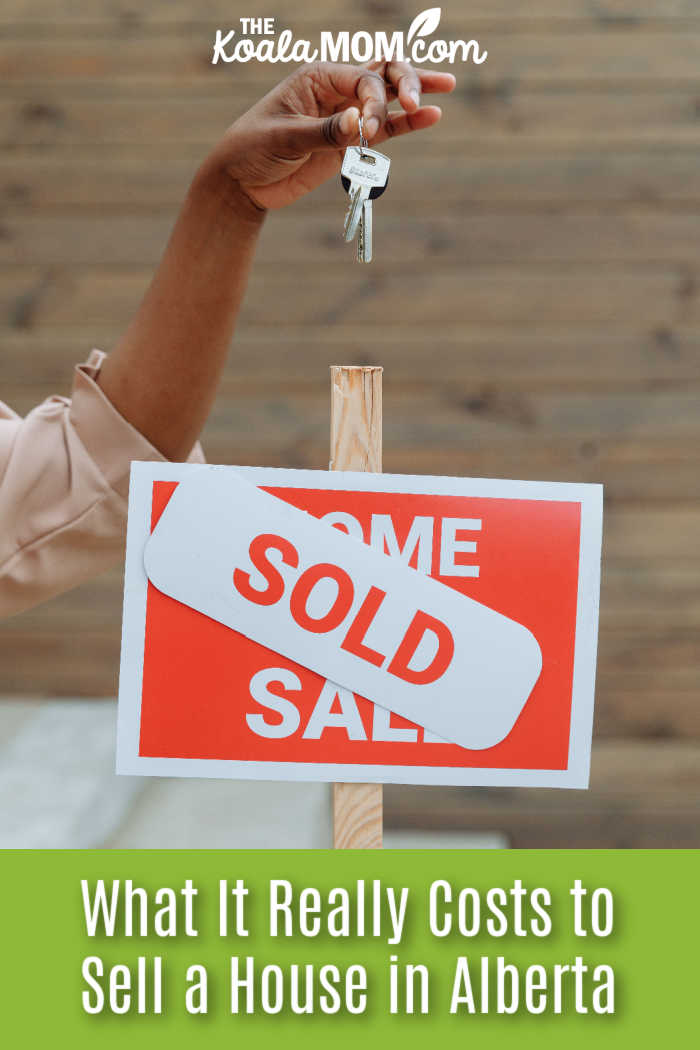 What It Really Costs to Sell a House in Alberta. Photo of hand holding keys over a "sold" sign by  Thirdman via Pexels.
