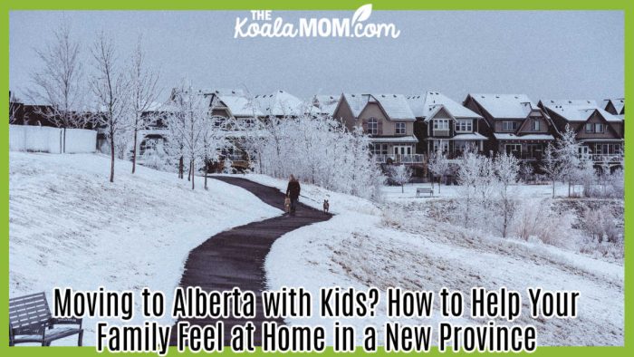 Moving to Alberta with Kids? How to Help Your Family Feel at Home in a New Province. Photo of shoveled sidewalk through snowy park with homes in the distance by Michael Job Loquellano via Pexels.