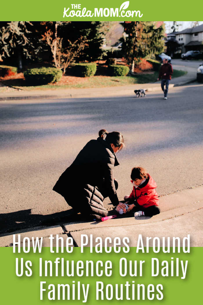 How the Places Around Us Influence Our Daily Family Routines. Photo of mom and child playing on a curb while man in background walks dog by PNW Production via Pexels.