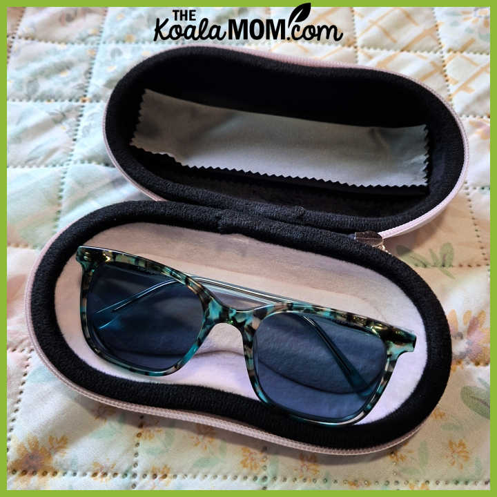 Pink Lolalet glasses case lays open with sunglasses inside. Photo by Bonnie Way.