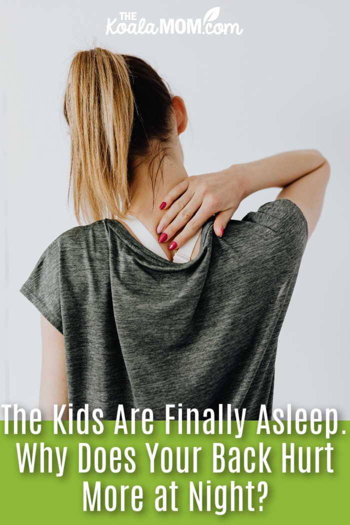 The Kids Are Finally Asleep. Why Does Your Back Hurt More at Night? Woman in casual wear holding neck, showing signs of discomfort or pain. Photo by https://kaboompics.com/ via Pexels.