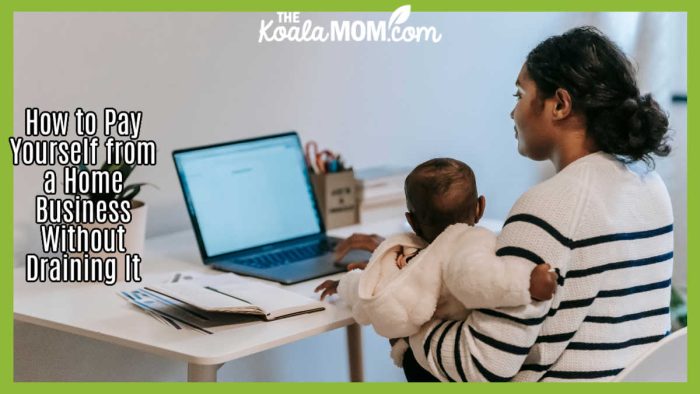 How to Pay Yourself from a Home Business Without Draining It. Photo of mom holding a baby on her arm while doing work / bookkeeping at a laptop by William Fortunato via Pexels.