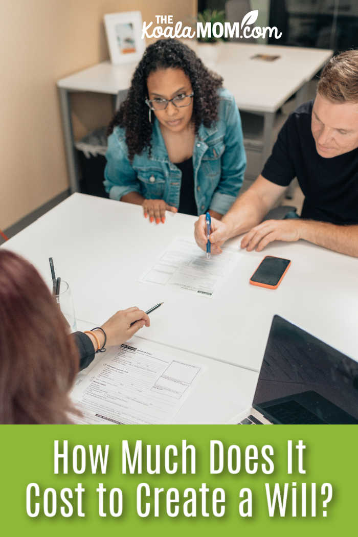 How Much Does It Cost to Create a Will? A couple discusses adoption papers with a professional in an office environment. Photo by Kindel Media via Pexels.